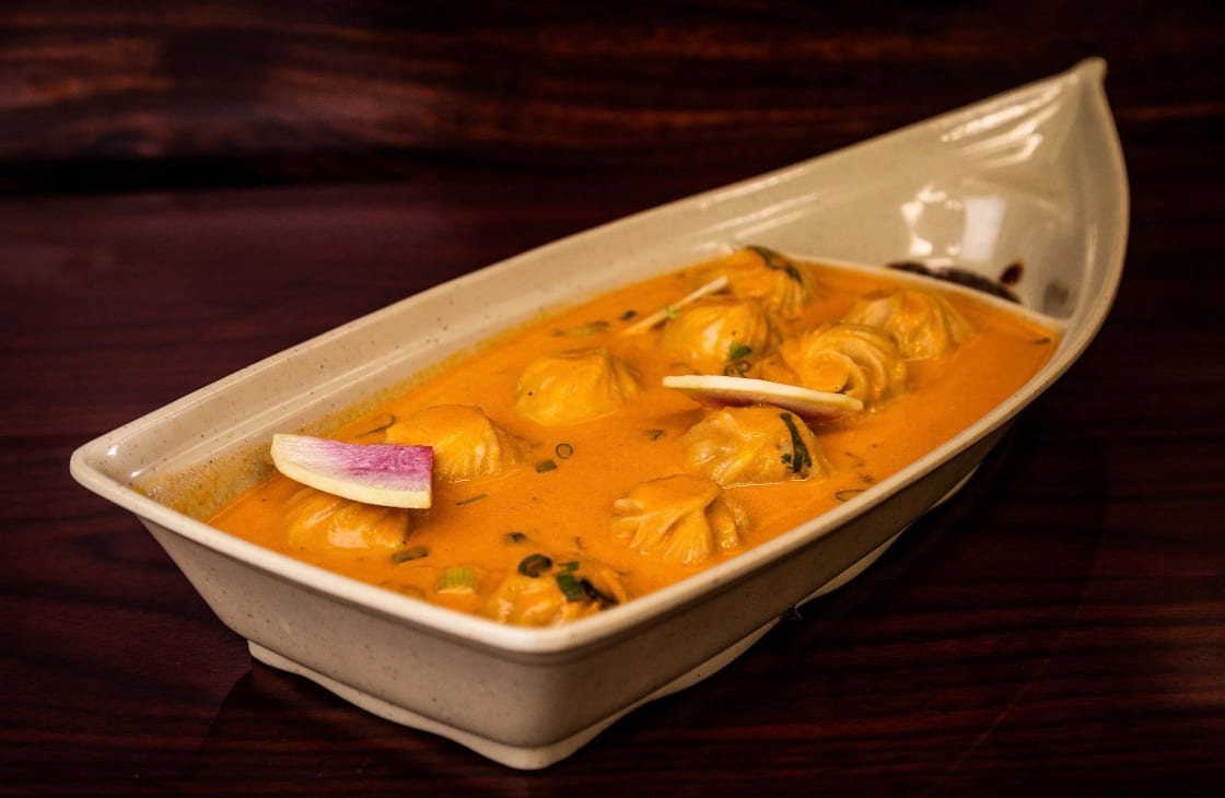 Titanic Chicken Jhol Momo-Chef Signature.